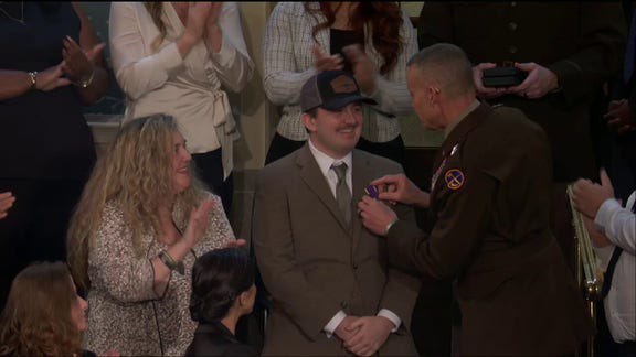 Trump awards Purple Hearts to National Guard members ambushed in Washington, DC: 'We love you all'